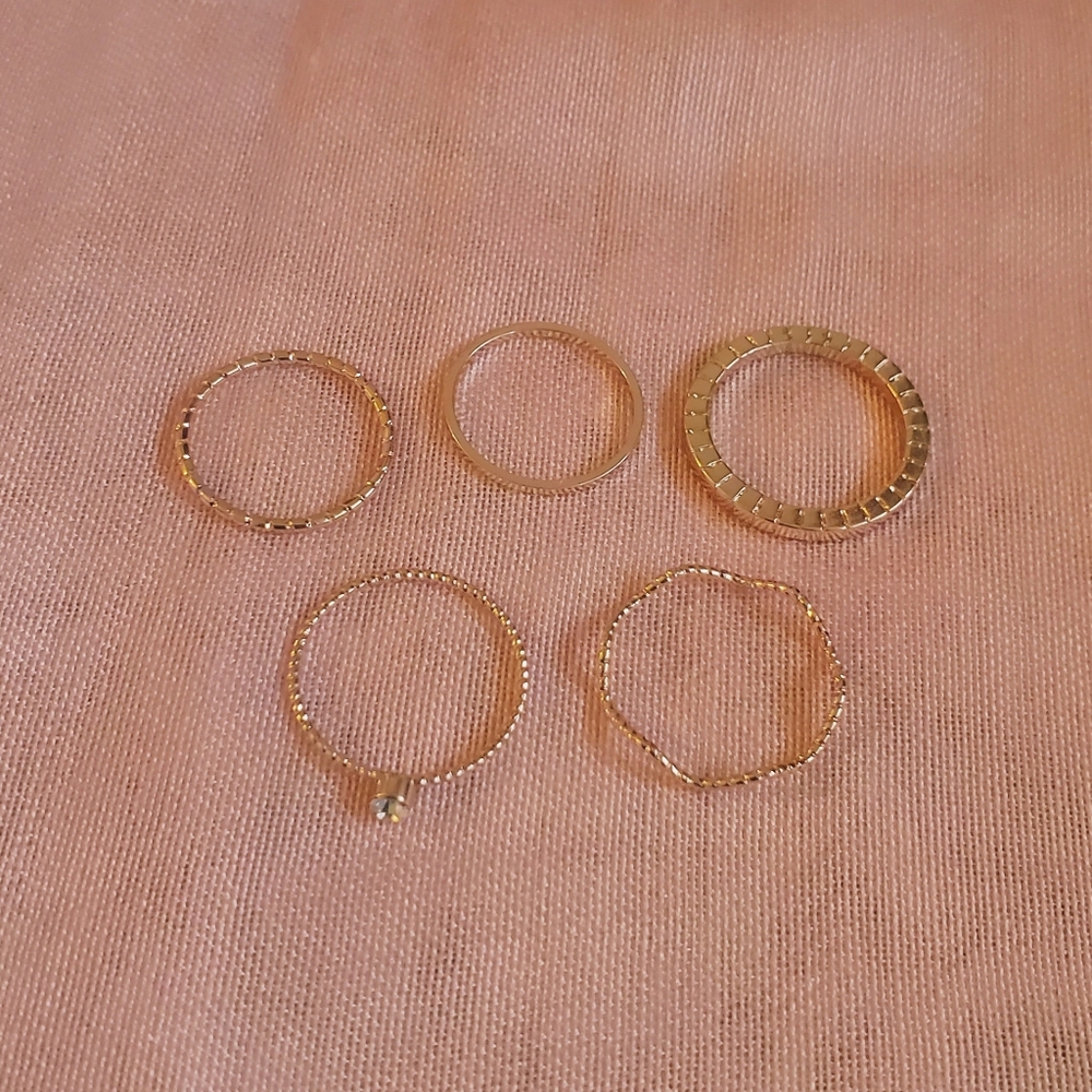 Gold curved ring set